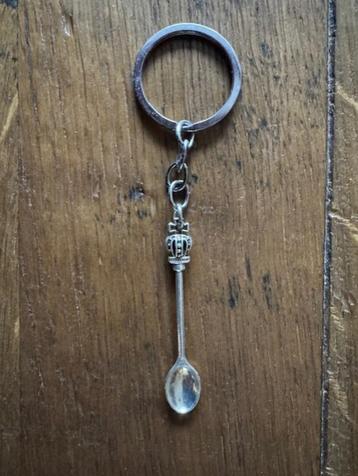 Sleutelhanger met theelepeltje beschikbaar voor biedingen