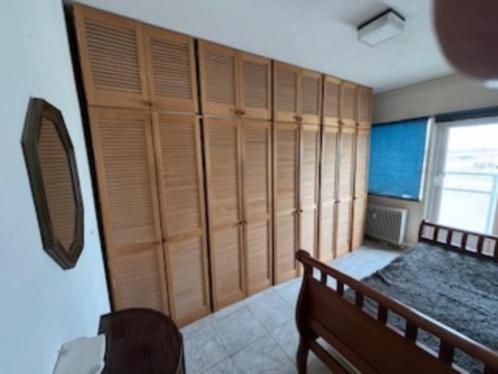 Vintage Kastenwand  met louvre deuren  (60-ties )- zandvoort, Huis en Inrichting, Kasten | Kledingkasten, Gebruikt, 200 cm of meer