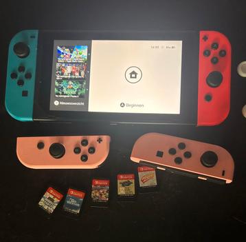 Nintendo Switch + 5 spellen en 2 extra controllers beschikbaar voor biedingen