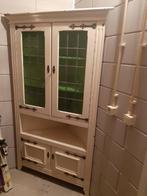 Hoekkast met groene glas in lood raampjes, Ophalen