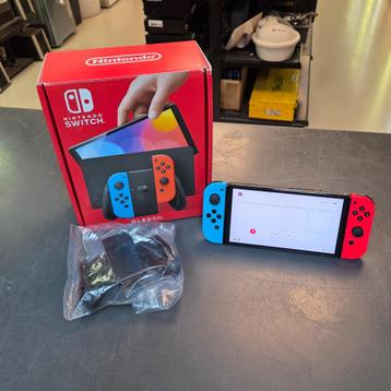 Nintendo Switch OLED-model - Red/Blue - Compleet met doos beschikbaar voor biedingen