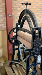 Antieke smeedijzeren Mangel, Ophalen