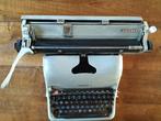 Vintage Olivetti typemachine, Ophalen
