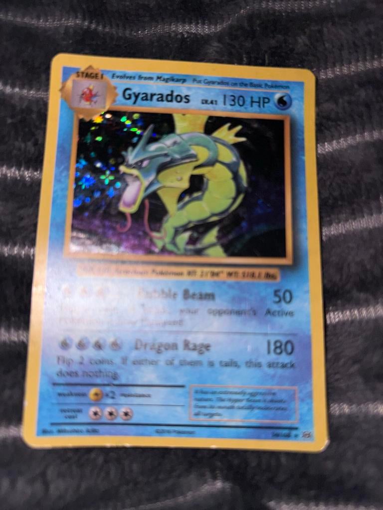 Gyarados Holo 2016 - Zeldzame Pokémon kaart!, Hobby en Vrije tijd, Verzamelkaartspellen | Pokémon, Gebruikt, Losse kaart, Foil