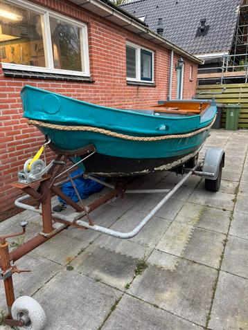 Stalen boot + trailer en zeil  beschikbaar voor biedingen
