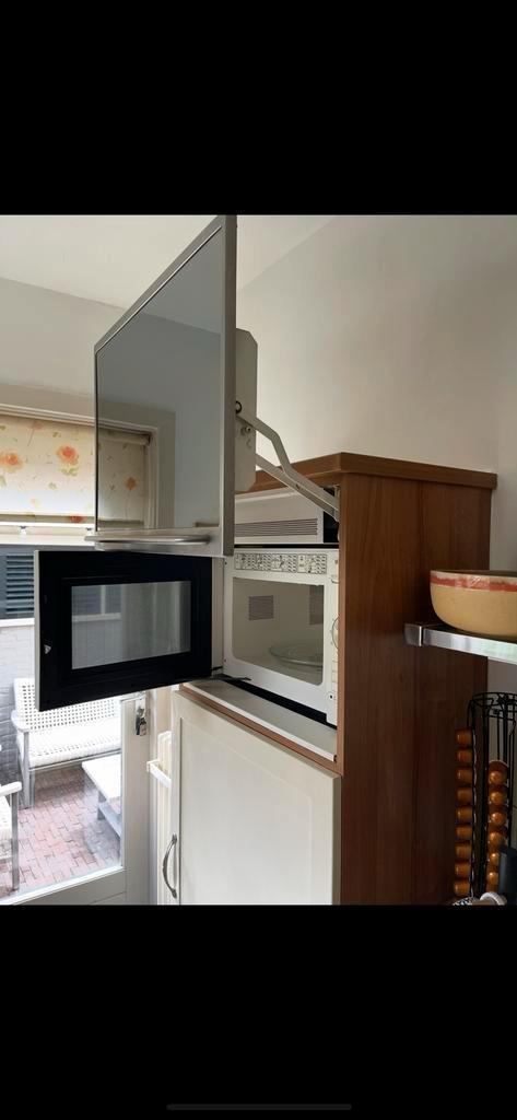 Atag liftdeur. Oerdegelijk materiaal. RVS met spiegel, Huis en Inrichting, Keuken | Keukenelementen, Gebruikt, Minder dan 100 cm