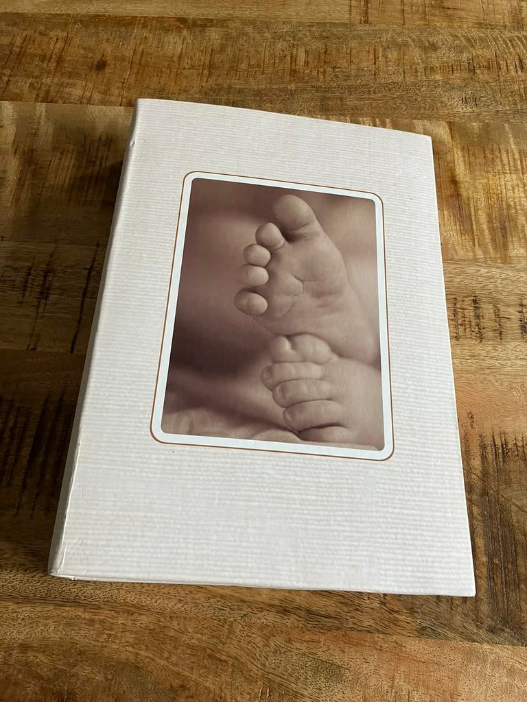 Henzo fotoboek, Ophalen of Verzenden, Gebruikt