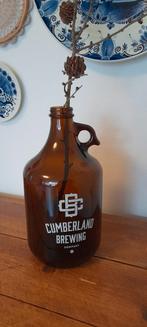 Vintage bruine fles vaas met oor en tekst, Huis en Inrichting, Woonaccessoires | Vazen, Overige kleuren, Ophalen of Verzenden