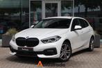 BMW 1-Serie (f40) 116i High Executive 109pk Aut | Stoelverwa, 65 €/maand, Stof, Gebruikt, Met garantie (alle)