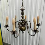 Antieke bronzen kroonluchter, Ophalen