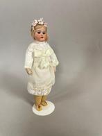 Klein antiek popje met porseleinen hoofdje uit circa 1920, Antiek en Kunst, Ophalen of Verzenden
