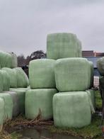 Ronde hooibalen gewikkeld in folie, Ophalen, Vee