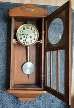 Antieke wandklok, Ophalen