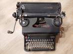 Vintage typemachine Olivetti, Ophalen