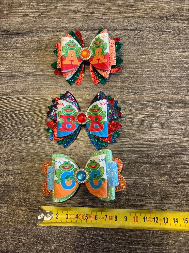 Haarspelden zwemdiploma A-B-C, Ophalen of Verzenden, Zo goed als nieuw