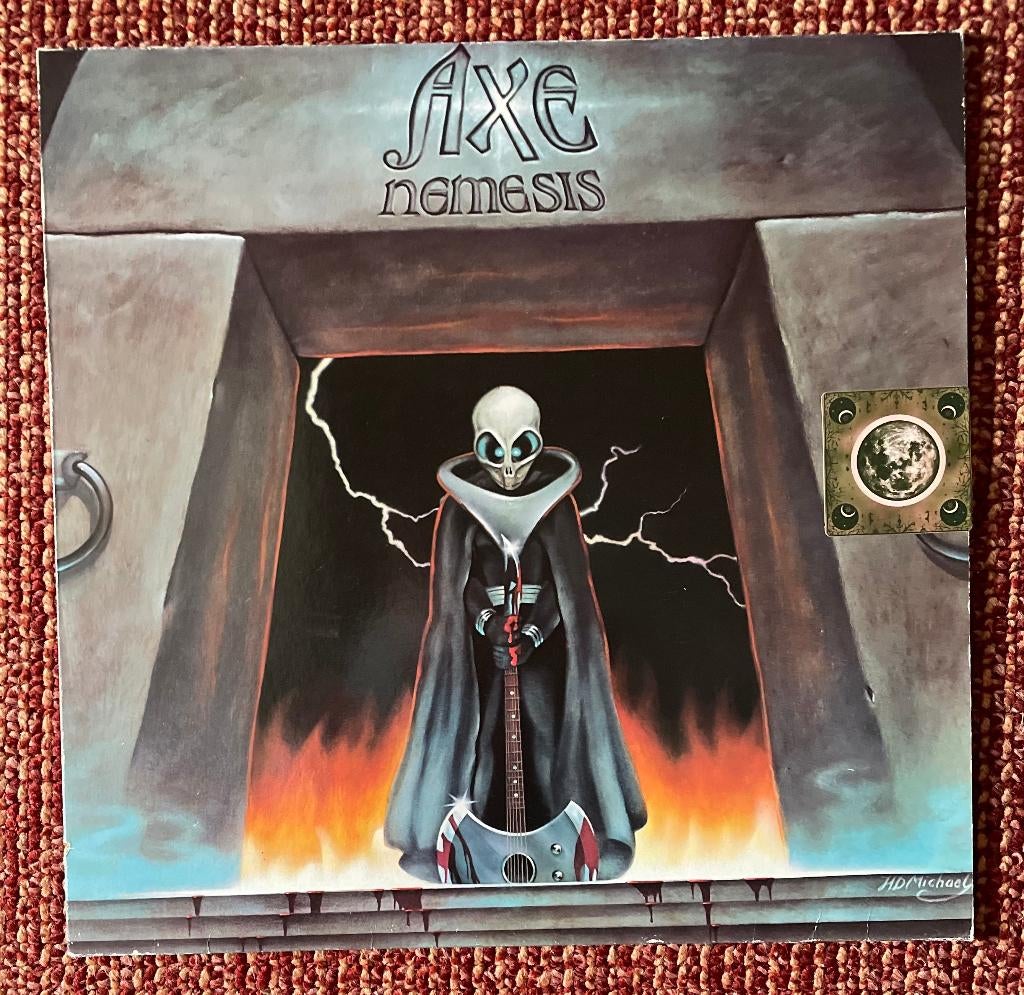 Axe – Nemesis, Ophalen of Verzenden, Zo goed als nieuw
