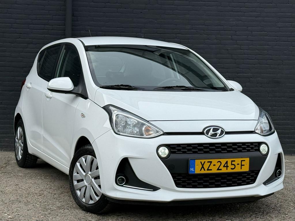 Hyundai I10 1.0i Comfort AIRCO | CRUISE | ELEK RAMEN | NWE A, Stof, Gebruikt, 4 stoelen, Wit