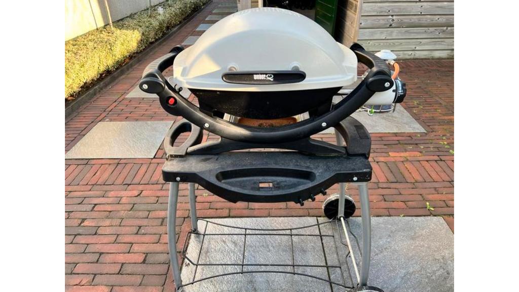 Weber Q gasbarbecue. opvouwbaar onderstel,afdekhoes gasfles, Tuin en Terras, Gasbarbecues, Ophalen of Verzenden, Zo goed als nieuw