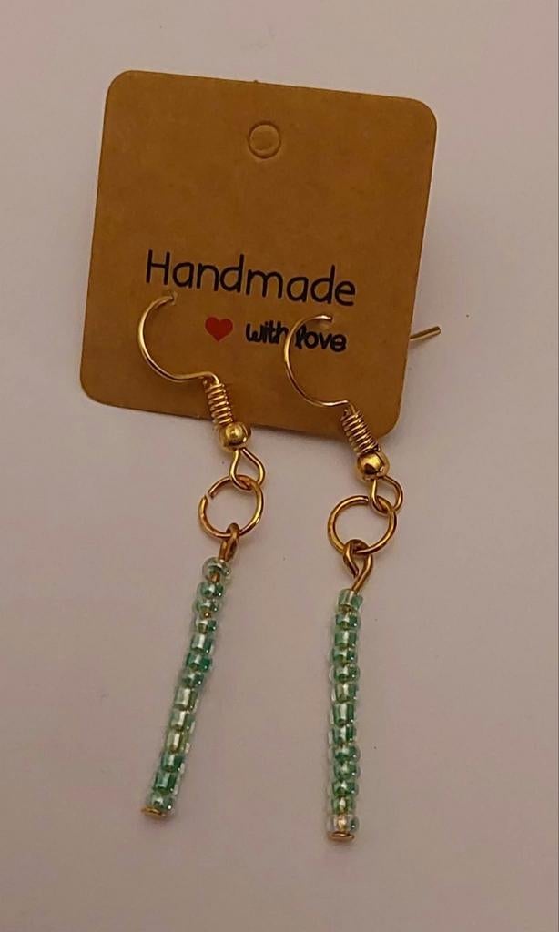 Handgemaakte oorbellen met groene kralen, Ophalen