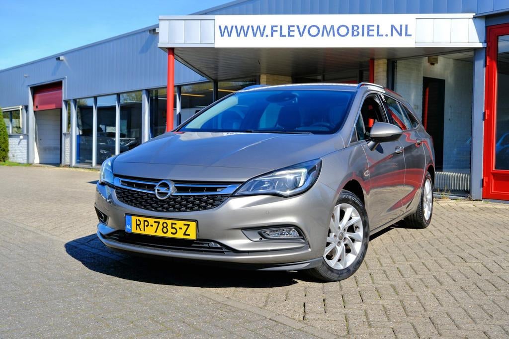 Opel Astra Sports Tourer 1.4 150pk Innovation Navi|Half Lede, Auto's, Opel, Voorwielaandrijving, Gebruikt, Euro 6, 4 cilinders