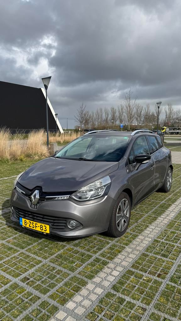 Renault Clio Energy TCe 90pk S&S 2015 Grijs, Auto's, Renault, Voorwielaandrijving, 898 cc, Origineel Nederlands, Handgeschakeld
