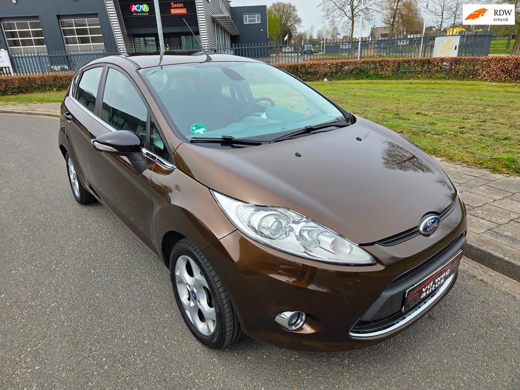 Ford Fiesta 1.25 Ghia 5 deurs zeer mooie auto, Voorwielaandrijving, Euro 5, Stof, 1242 cc