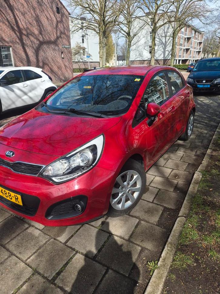 Kia Rio 1.2 I 5DRS 2014 Rood, Auto's, Kia, Particulier, Rio, Airbags, Airconditioning, Alarm, Centrale vergrendeling, Elektrische ramen