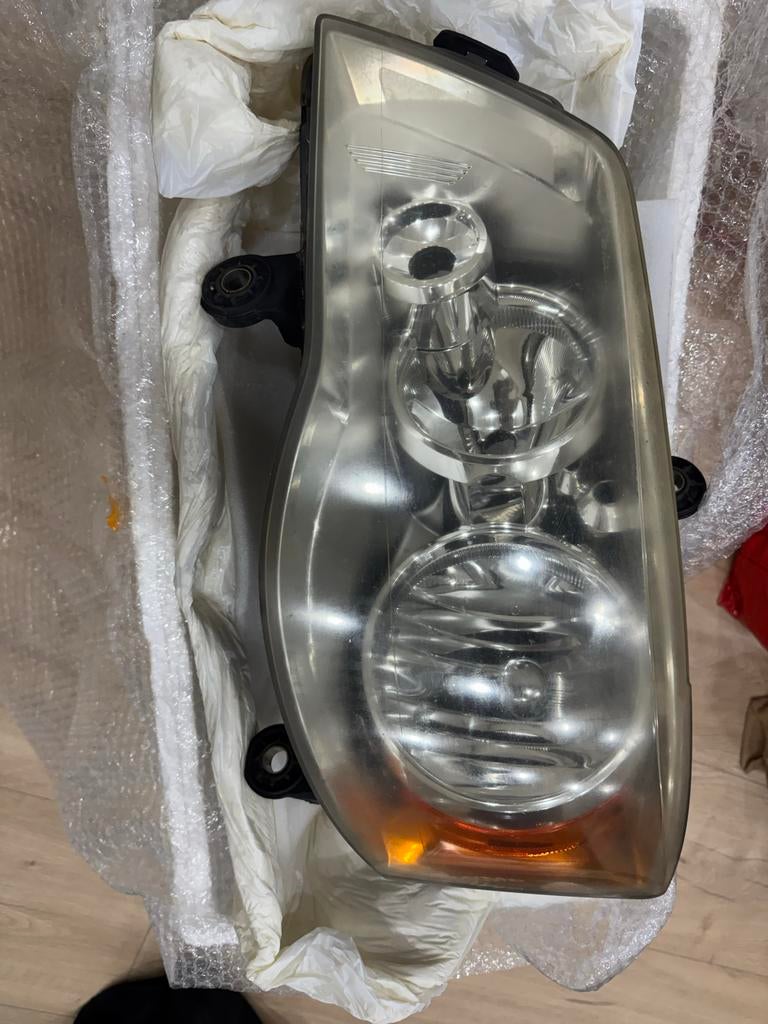 Koplampen Dodge Grand Caravan / Chrysler Grand Voyager, Ophalen of Verzenden, Gebruikt, Dodge