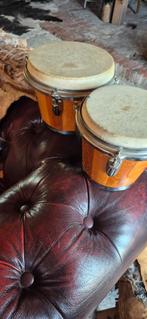 Dubbele djembe, Ophalen