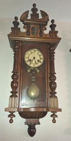 klassieke regulateur klok, Ophalen