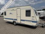 Adria Unica 502 UP bouwjaar 2003 met voortent, Caravans en Kamperen, Schokbreker, Rondzit, Bedrijf, 750 - 1000 kg