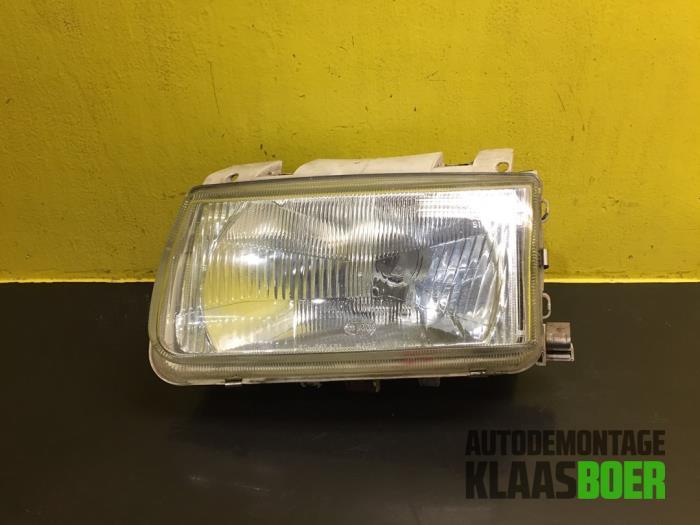 Koplamp links van een Volkswagen Polo, Auto-onderdelen, Verlichting, Volkswagen, Gebruikt, 6 maanden garantie, 12 maanden garantie