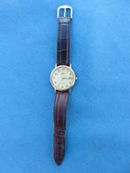 Horloge quartz met leren bandje – 2e de helft 20e eeuw, Antiek en Kunst, Antiek | Klokken, Ophalen of Verzenden