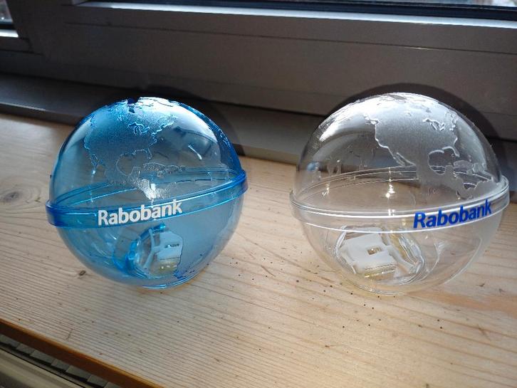 spaarpotjes (wereldbolletjes - Rabobank), Verzamelen, Spaarpotten, Nieuw, Object of Gebouw, Kunststof, Ophalen of Verzenden