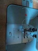 antiek elektrisch naaimachine, Ophalen