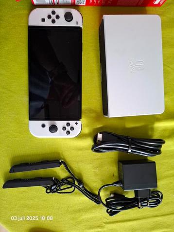 Nintendo switch oled,super Mario controller en game doosje. beschikbaar voor biedingen