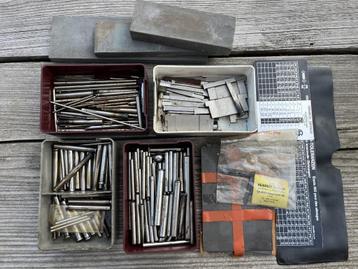 Sleuf veerpennen en bijbehoren beschikbaar voor biedingen