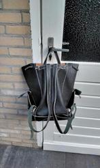 Rugtas, Ophalen, Zo goed als nieuw