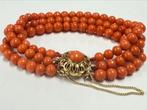 16473 Diep rood.Tijdloos. Vol karakter met 14k goud, Ophalen of Verzenden, Zo goed als nieuw, Met bedels of kralen, Rood