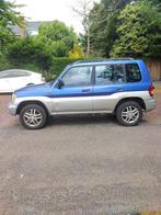 Mitsubishi Pajero 1.8 16V MPI 5DRS 2002 Blauw PININ, Auto's, Mitsubishi, Stof, 4 cilinders, Blauw, Bedrijf