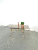 Rookglas salontafel  goudkleurige poten uit Zweden vintage, Gebruikt, 100 tot 150 cm, Glas, Rechthoekig