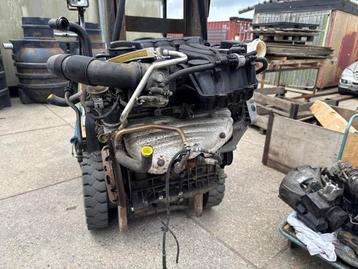 Motor van een Volkswagen Caddy beschikbaar voor biedingen