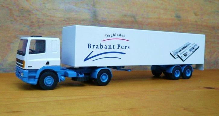 Lion Daf 85 + oplegger brabant pers dagbladen., Hobby en Vrije tijd, Modelauto's | 1:50, Gebruikt, Bus of Vrachtwagen, Lion Toys