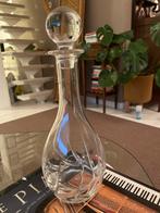 Kristallen karaf met stop, Ophalen