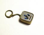 Vintage St. Thomas speldoos sleutelhanger van de 70 jaren., Ophalen of Verzenden