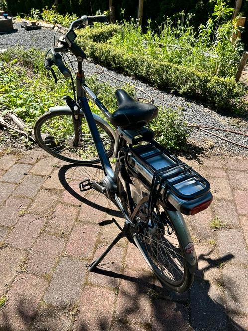 Elektrische heren fiets Sparta M8E, Fietsen en Brommers, Elektrische fietsen, Gebruikt, Sparta, 50 km per accu of meer, Ophalen