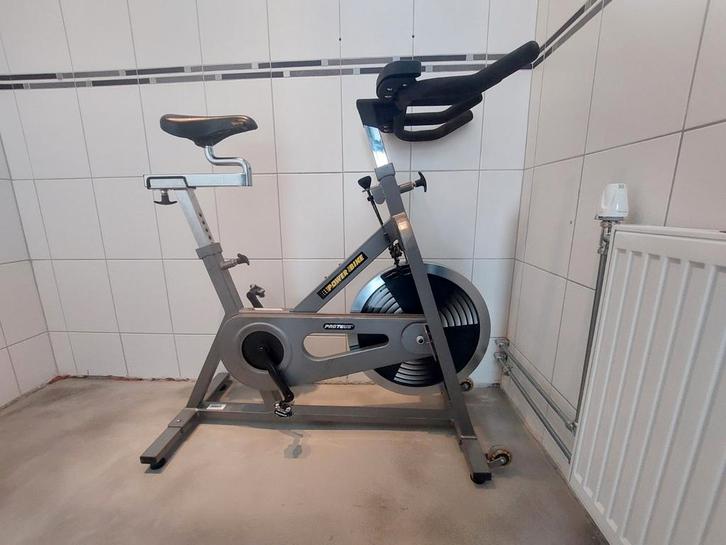 Spinningfiets Proteus powerbike, Sport en Fitness, Fitnessapparatuur, Gebruikt, Spinningfiets, Benen, Metaal, Ophalen