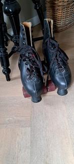 Rolschaatsen maat 40, Ophalen
