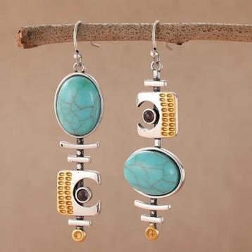 A-symmetrische oorbellen met turquoise natuursteen beschikbaar voor biedingen