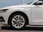 Skoda Octavia Combi 1.4 TSI 204 pk DSG iV PHEV Business Edit, Stof, Gebruikt, 4 cilinders, Wit